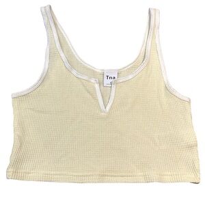 TNA women's cropped pale yellow/white waffle style tank top, size small.